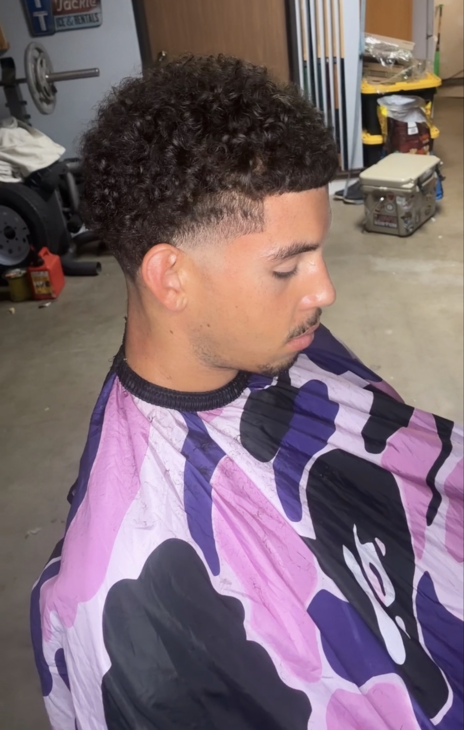high taper on the sides low taper in the back with lineup